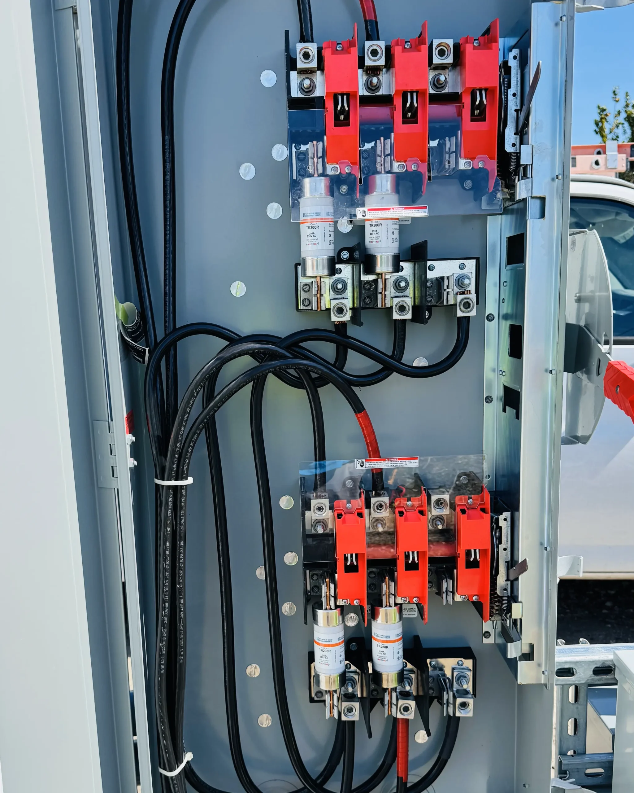 Electrical equipment and connections inside an enclosure